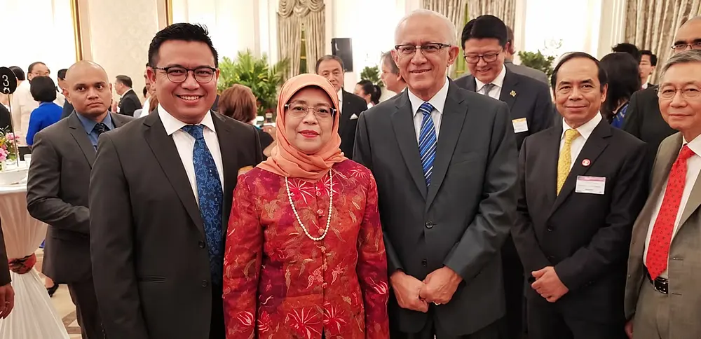 Prof Dr M Nazri Muhd with President Halimah Yacob of Singapore