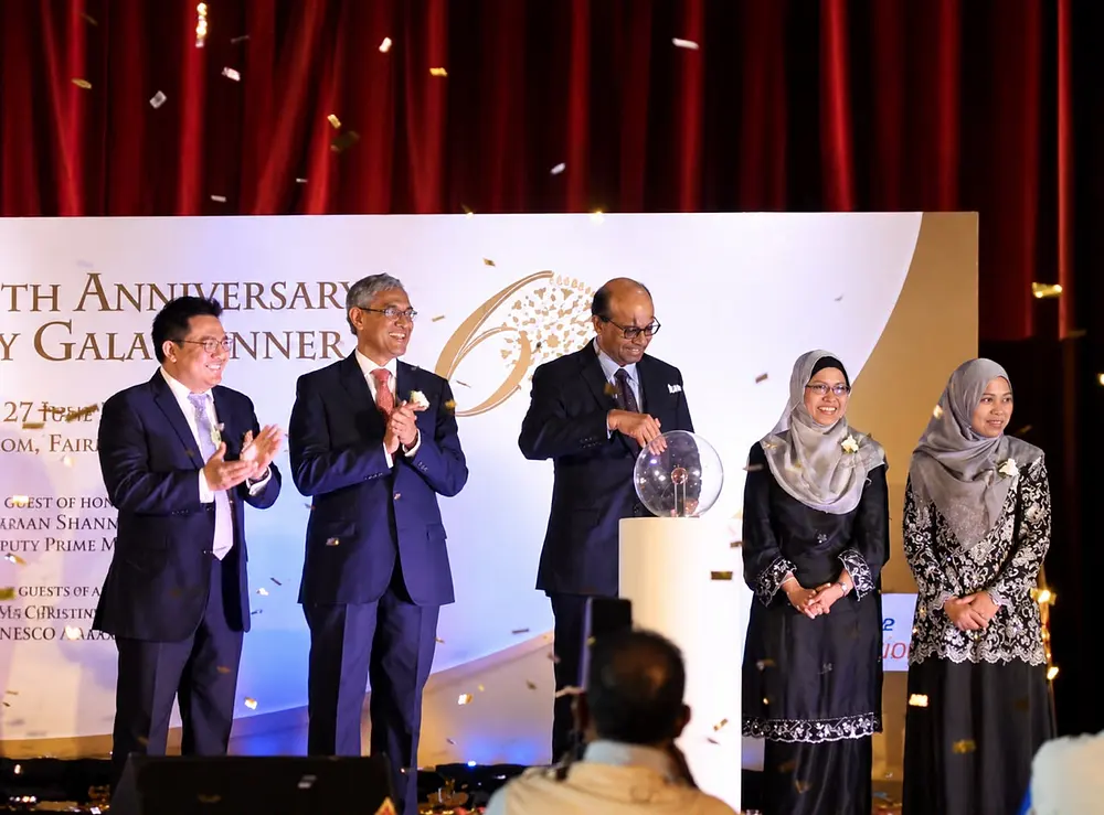 On stage with Deputy Prime Minister Tharman Shanmugaratnam at a gala dinner