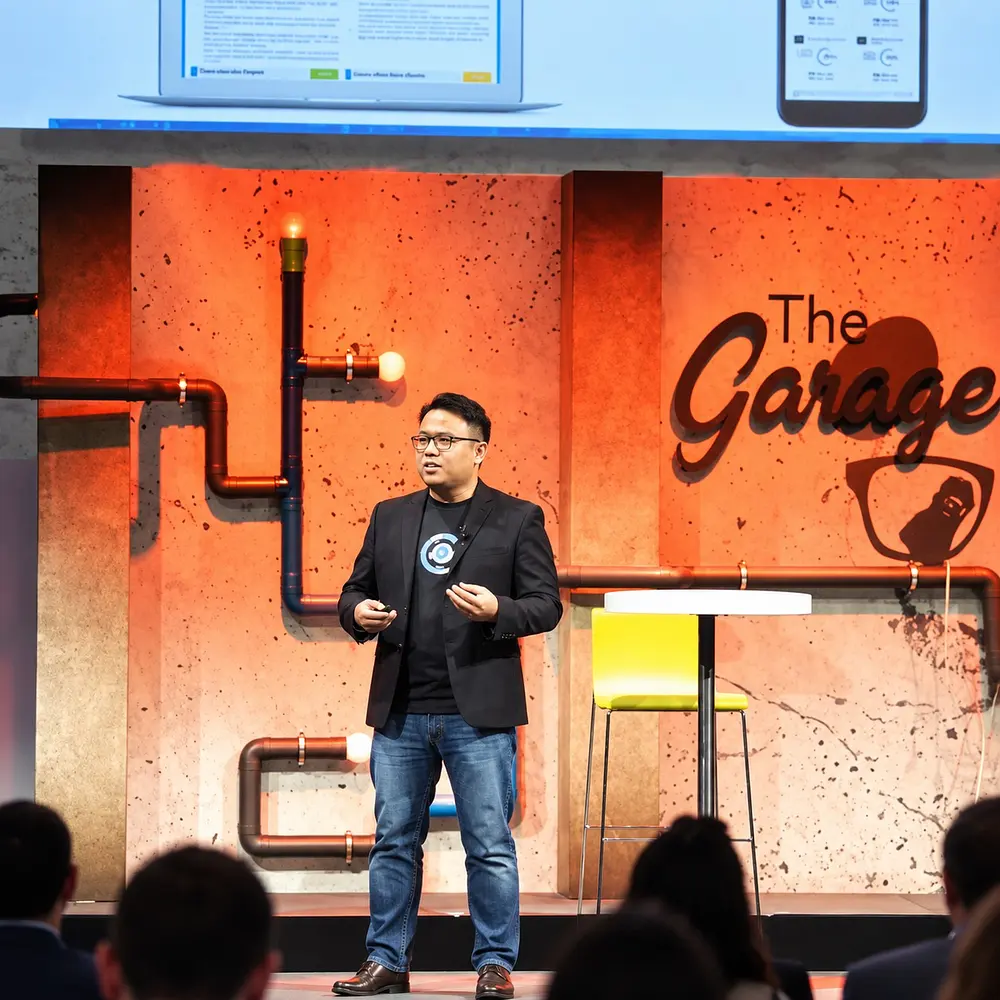 Speaking on stage at The Garage